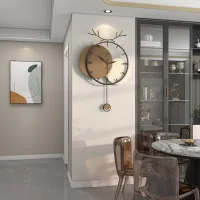 Stylish Modern Wall Clock with Antler Design and Pendulum