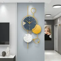 Modern Wall Clock with Gold Accents and Marble Disc