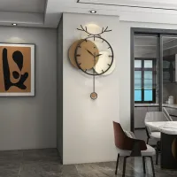 Stylish Modern Wall Clock with Antler Design and Pendulum