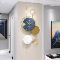 Modern Wall Clock with Gold Accents and Marble Disc