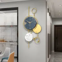 Modern Wall Clock with Gold Accents and Marble Disc