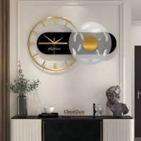 Elegant Gold Feather Accent Wall Clock