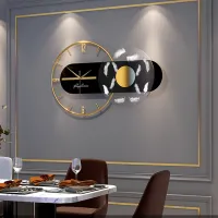 Elegant Gold Feather Accent Wall Clock